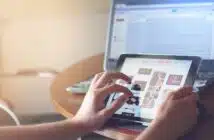 person holding black iPad