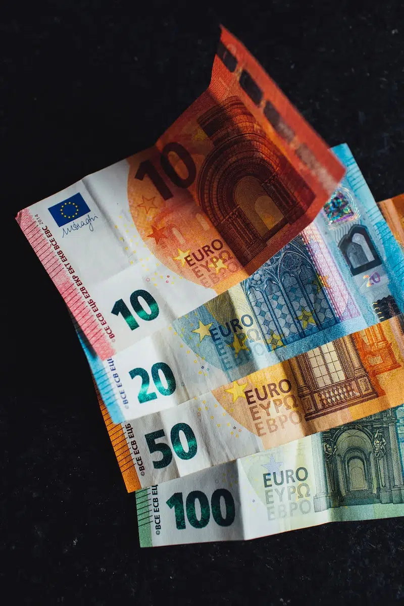 10 euro bill on black textile